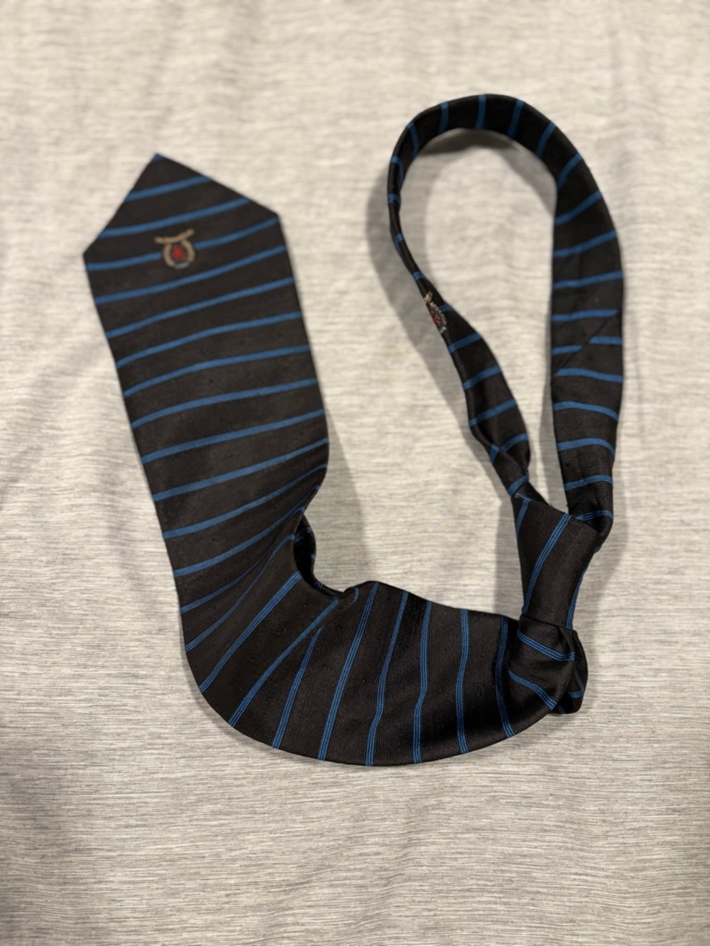 Tommy Hilfiger Black Tie with Blue Stripes and Crest